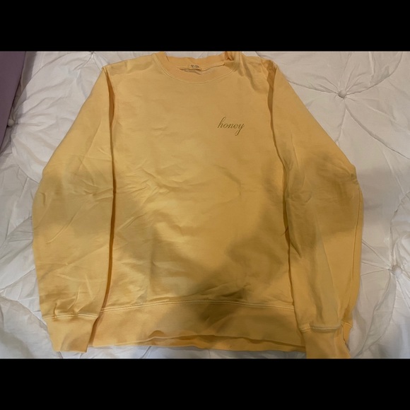 cute yellow sweatshirt